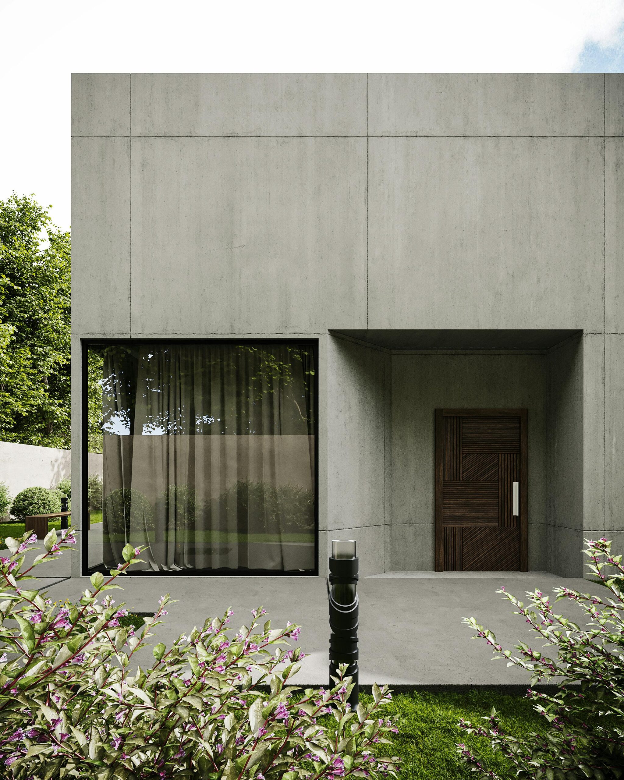 Minimalist concrete house exterior with wooden door and large glass window.